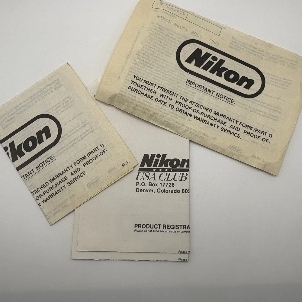 Vintage Nikon N4004 AF 35mm SLR Film Camera Body Only W/ Manuals Bag Powers On